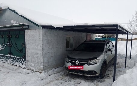 Renault Logan II, 2014 год, 450 000 рублей, 2 фотография