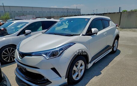 Toyota C-HR I рестайлинг, 2017 год, 2 000 000 рублей, 12 фотография