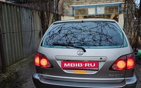 Lexus RX IV рестайлинг, 1999 год, 870 000 рублей, 17 фотография