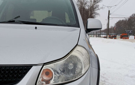 Suzuki SX4 II рестайлинг, 2010 год, 873 000 рублей, 21 фотография