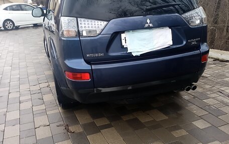 Mitsubishi Outlander III рестайлинг 3, 2007 год, 990 000 рублей, 2 фотография