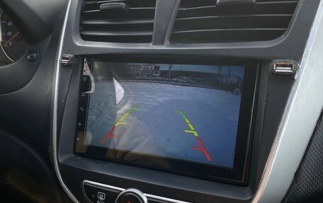 Hyundai Solaris II рестайлинг, 2011 год, 650 000 рублей, 22 фотография