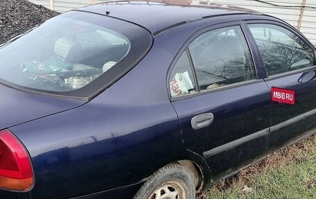 Mitsubishi Carisma I, 1998 год, 100 000 рублей, 6 фотография