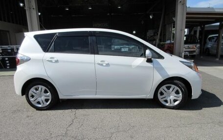 Toyota Ractis II, 2013 год, 737 000 рублей, 2 фотография