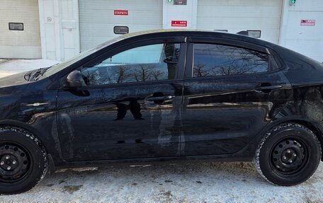 KIA Rio III рестайлинг, 2012 год, 680 000 рублей, 7 фотография