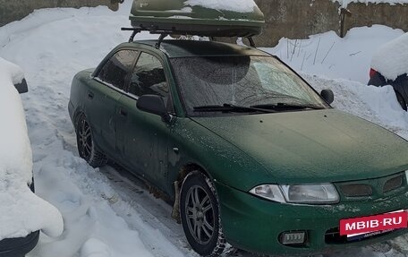 Mitsubishi Carisma I, 1998 год, 220 000 рублей, 4 фотография