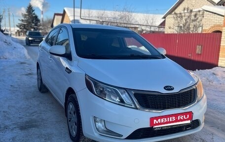 KIA Rio III рестайлинг, 2013 год, 670 000 рублей, 2 фотография