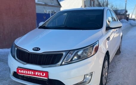 KIA Rio III рестайлинг, 2013 год, 670 000 рублей, 3 фотография