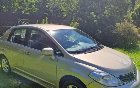 Nissan Tiida, 2010 год, 865 000 рублей, 2 фотография