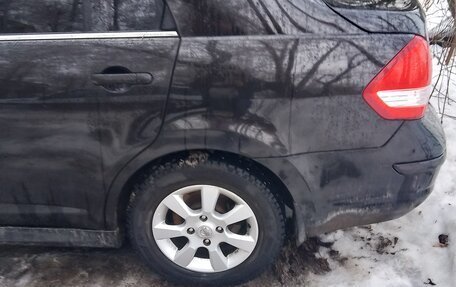 Nissan Tiida, 2011 год, 750 000 рублей, 5 фотография