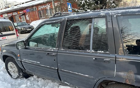 Jeep Grand Cherokee, 1998 год, 590 000 рублей, 11 фотография