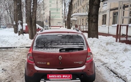 Renault Sandero I, 2013 год, 560 000 рублей, 2 фотография