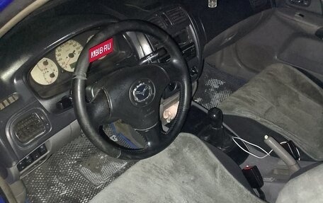 Mazda 323, 2003 год, 220 000 рублей, 5 фотография