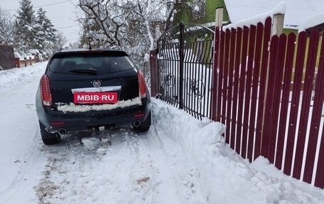 Cadillac SRX II рестайлинг, 2010 год, 1 300 000 рублей, 18 фотография