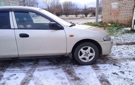 Mazda 323, 1997 год, 150 000 рублей, 3 фотография