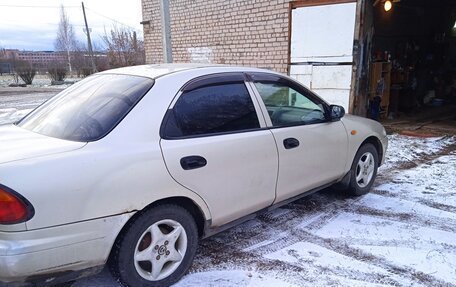 Mazda 323, 1997 год, 150 000 рублей, 4 фотография