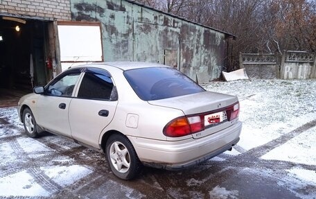 Mazda 323, 1997 год, 150 000 рублей, 2 фотография