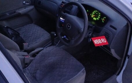 Mazda Familia, 2003 год, 230 000 рублей, 12 фотография