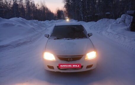 Mazda Familia, 2003 год, 230 000 рублей, 14 фотография