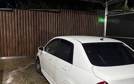 Nissan Tiida, 2010 год, 600 000 рублей, 4 фотография