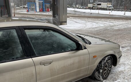 Mazda 323, 1999 год, 300 000 рублей, 4 фотография