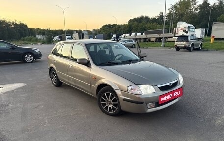 Mazda 323, 1999 год, 300 000 рублей, 8 фотография
