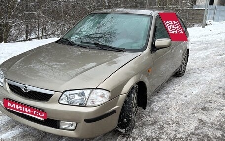 Mazda 323, 1999 год, 300 000 рублей, 2 фотография
