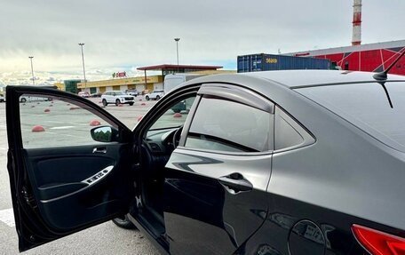 Hyundai Solaris II рестайлинг, 2011 год, 640 000 рублей, 19 фотография