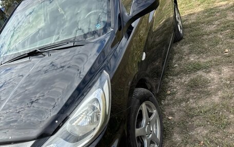 Hyundai Solaris II рестайлинг, 2011 год, 660 000 рублей, 10 фотография