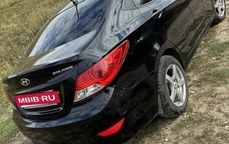 Hyundai Solaris II рестайлинг, 2011 год, 660 000 рублей, 14 фотография