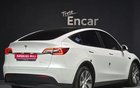 Tesla Model Y I, 2022 год, 6 950 000 рублей, 2 фотография