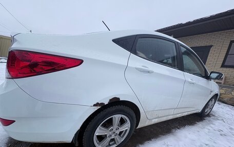 Hyundai Solaris II рестайлинг, 2011 год, 650 000 рублей, 2 фотография