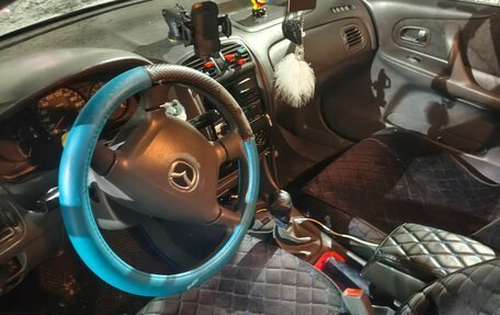 Mazda 323, 2000 год, 300 000 рублей, 6 фотография