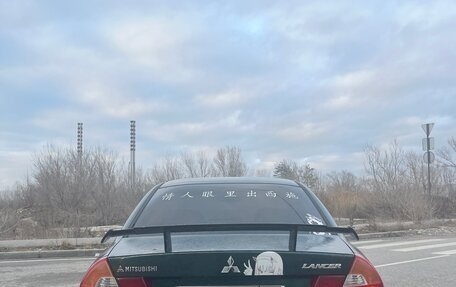 Mitsubishi Lancer VII, 1998 год, 300 000 рублей, 10 фотография