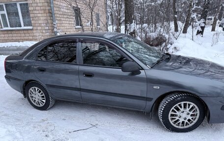 Mitsubishi Carisma I, 2003 год, 310 000 рублей, 4 фотография