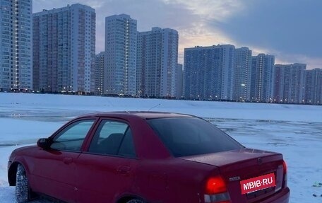 Mazda Familia, 1998 год, 200 000 рублей, 5 фотография