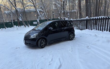 Toyota Ractis I, 2010 год, 950 000 рублей, 4 фотография