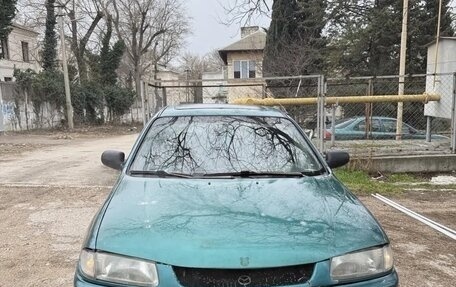 Mazda 323, 1997 год, 235 000 рублей, 1 фотография