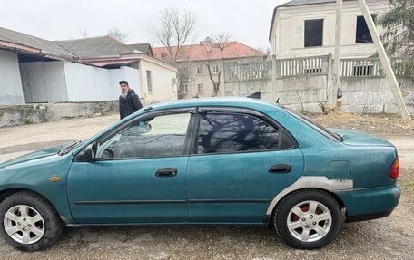 Mazda 323, 1997 год, 235 000 рублей, 4 фотография