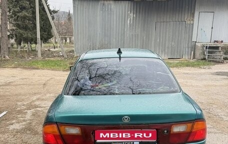 Mazda 323, 1997 год, 235 000 рублей, 3 фотография