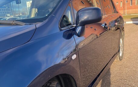 Nissan Tiida, 2010 год, 950 000 рублей, 9 фотография