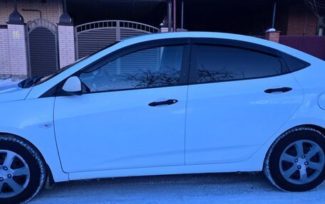 Hyundai Solaris II рестайлинг, 2013 год, 650 000 рублей, 4 фотография