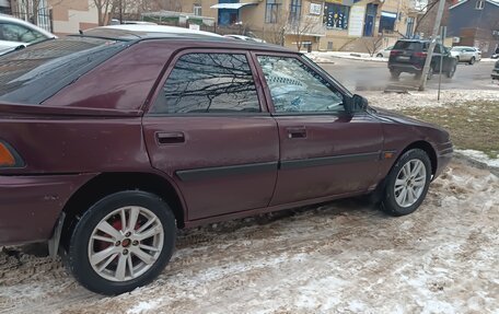 Mazda 323, 1990 год, 150 000 рублей, 3 фотография