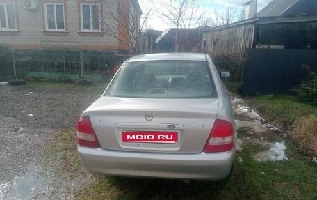 Mazda Familia, 1998 год, 120 000 рублей, 4 фотография