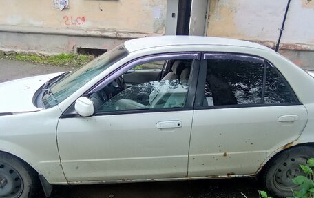 Mazda Familia, 1999 год, 100 000 рублей, 8 фотография