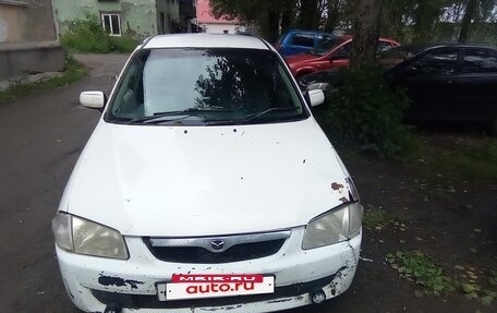 Mazda Familia, 1999 год, 100 000 рублей, 9 фотография