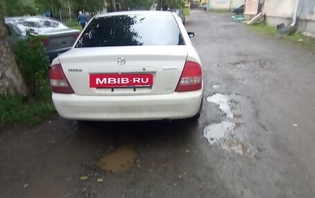 Mazda Familia, 1999 год, 100 000 рублей, 11 фотография