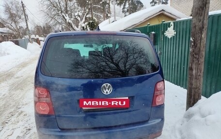 Volkswagen Touran III, 2010 год, 950 000 рублей, 8 фотография