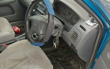 Mazda Familia, 1999 год, 310 000 рублей, 2 фотография