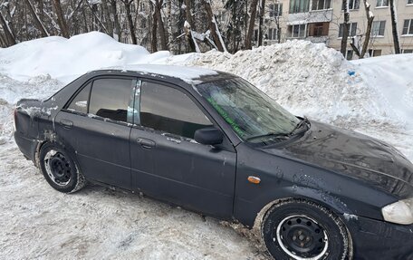 Mazda Protege, 1999 год, 210 000 рублей, 3 фотография